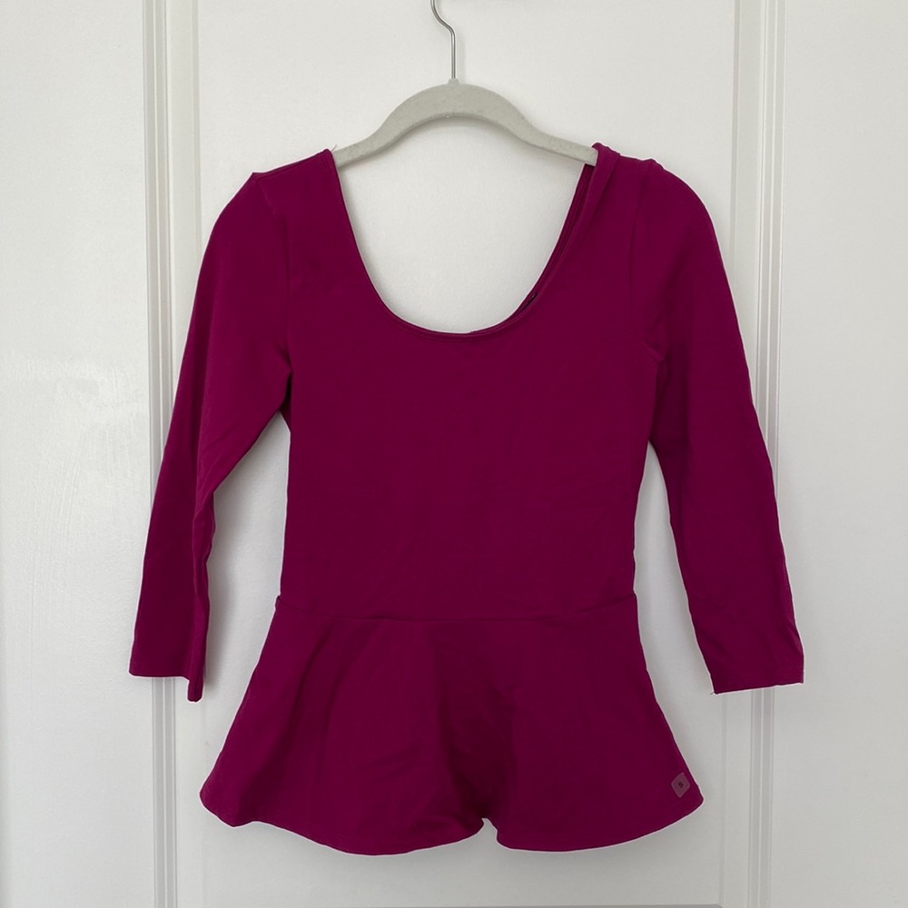 Brand new Peplum Express top